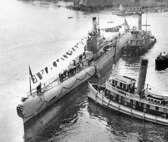 USS V-3 with tugs along side after launch