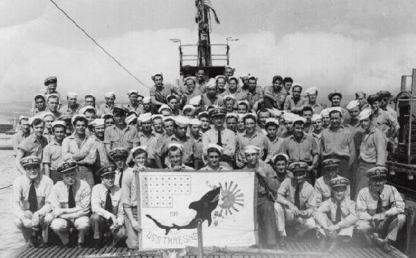 End of war crew photo with battle flag