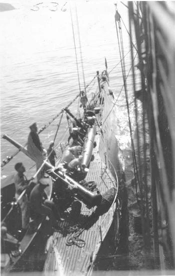 S-36 loading torpedoes from a tender