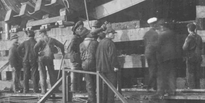 Workers waiting under the hull