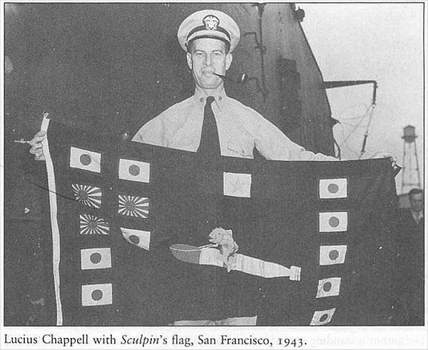 Lt. Commander Lucius H Chappell with the Sculpin Battleflag 1943