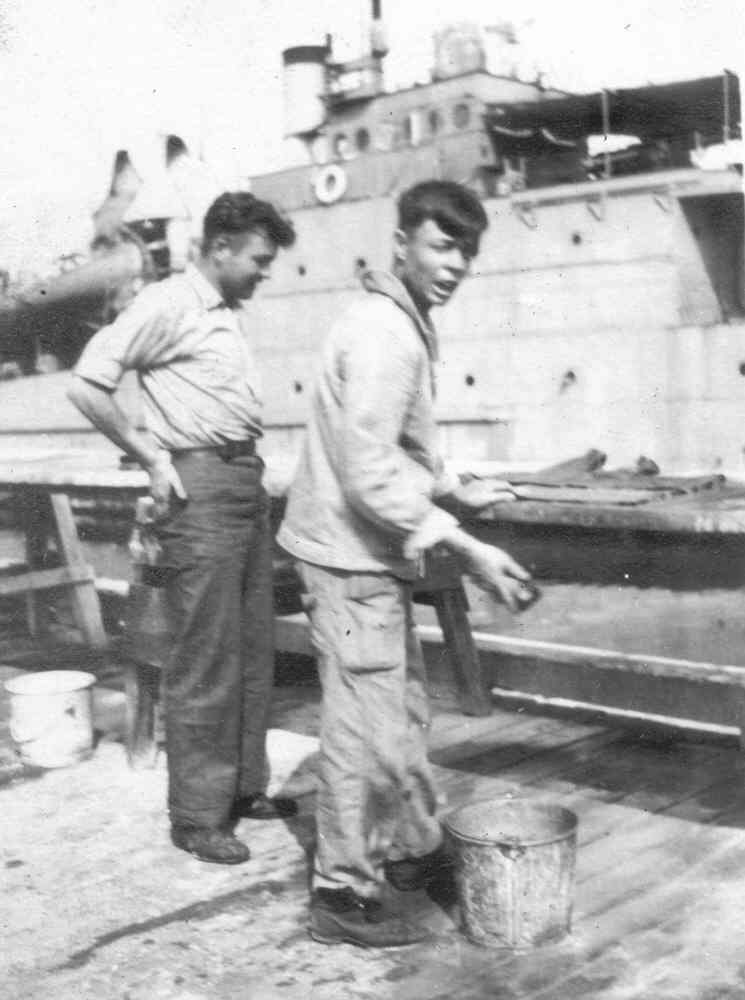 USS R-14 crew members Dorsy & Bridges on the pier