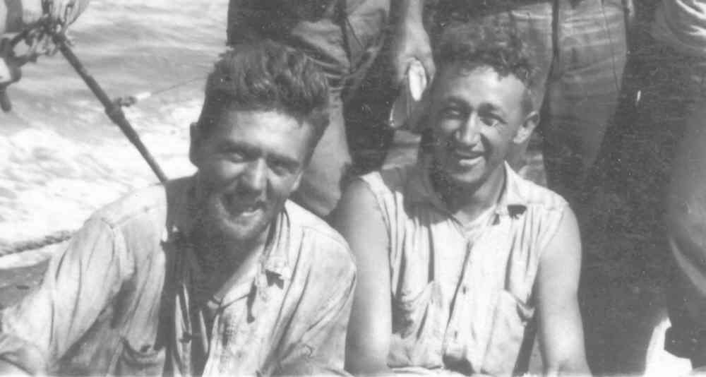 USS R-14 gun crew pose for the camera at sea