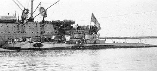 USS O-8 moored to a tender