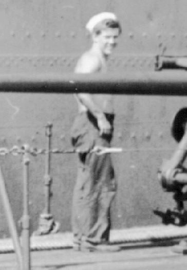 Close-up of deck gun crew member