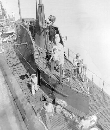 Photo from the USS Fulton AS 11 looking down on USS PLunger