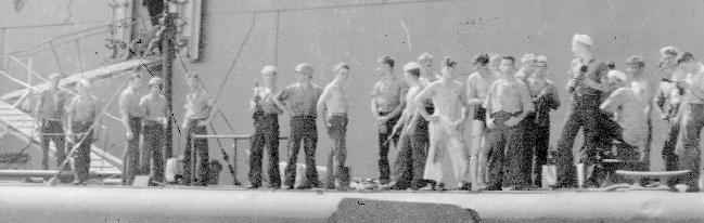 Work crew on foredeck of USS PLunger July 21, 1942