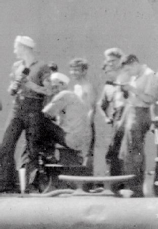 Work crew on foredeck of USS PLunger July 21, 1942