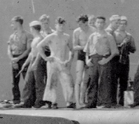 Work crew on foredeck of USS PLunger July 21, 1942