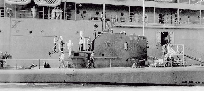 Crew working on deck equipment of USS PLunger July 22, 1942