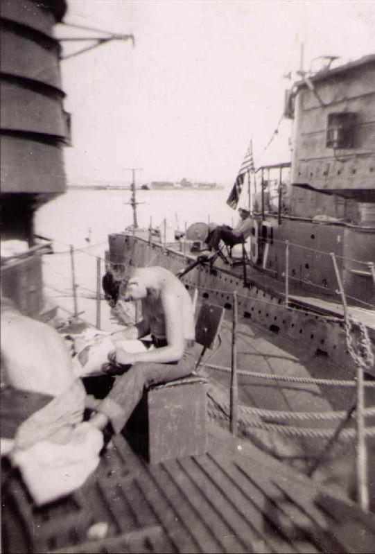 R-6 2 crew on deck r-10 alongside