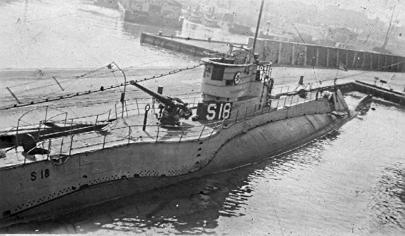 USS S-18 moored to dock