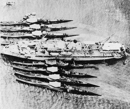 Eight S-boats moored to a tender