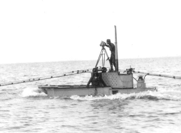 USS S-1 submerging with cameraman on bridge