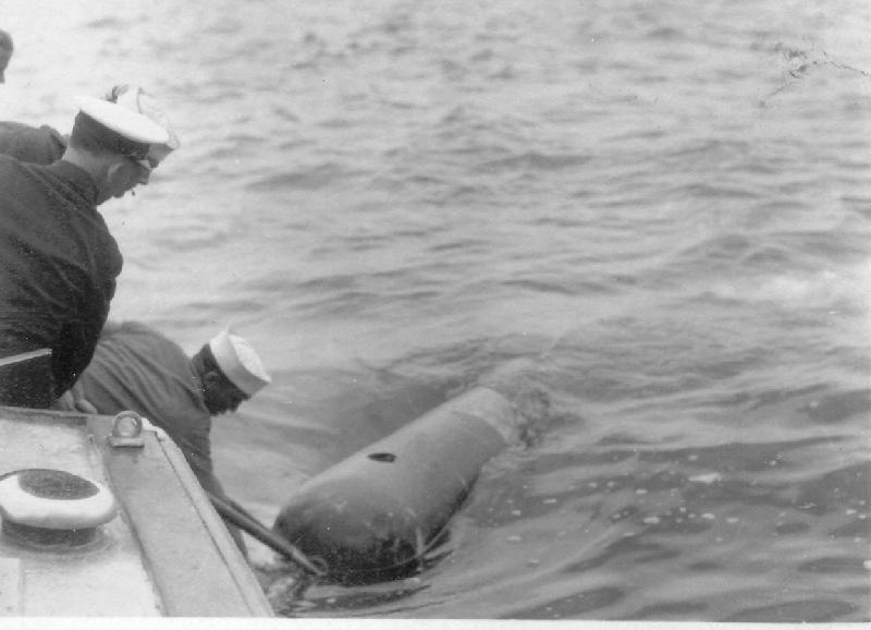 Torpedo being retrieved by tender