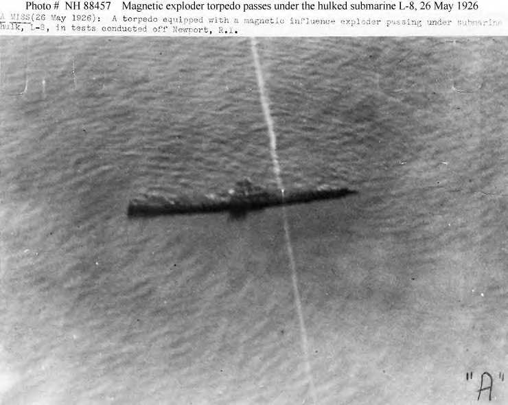 First torpedo shot passes under the USS L-8