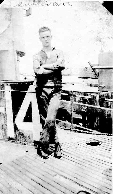 USS R-14 crew member Sulivan posing on the deck