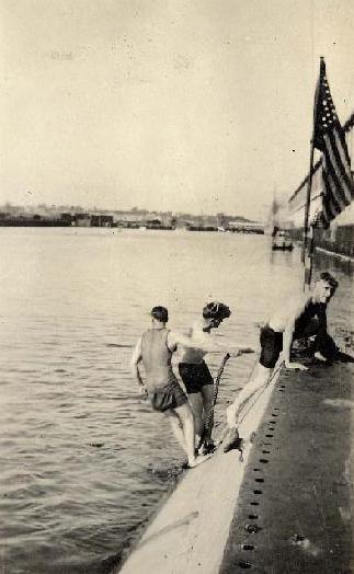 Some crew swimming off the stern at San Pedro